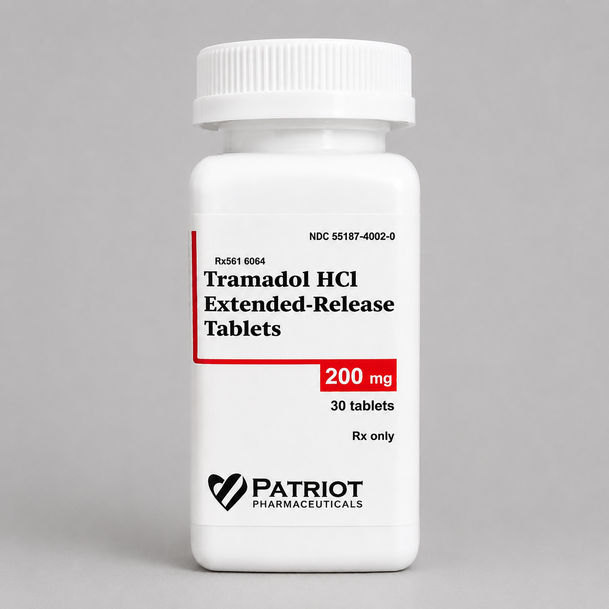 Close up view of round white two hundred milligram compressed caplets on a clean background